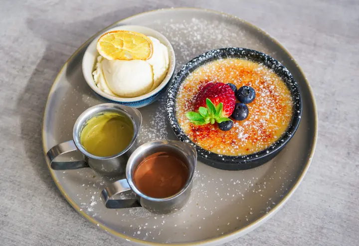 A dessert plate with sauces
